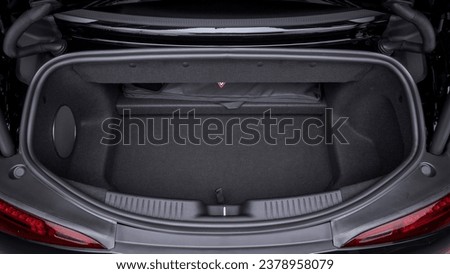 Looking down at a car trunk open