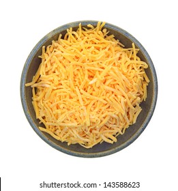 Looking Down At A Dish Of Shredded Cheddar Cheese.