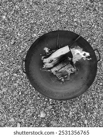 Looking down at a fire pit. Black white photo.