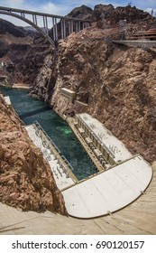 Looking down the Hoover Dam with a view of the Highway 93 bridge
