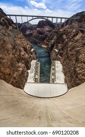 Looking down the Hoover Dam with a view of the Highway 93 bridge