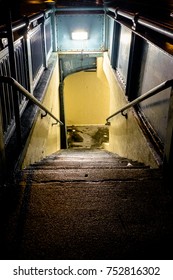 Looking Down Into A Subway Entrance At Night