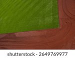 looking down at the Left Field corner and warning track from above Green Monster, Fenway Park, Boston Red Sox, green grass, brown dirt