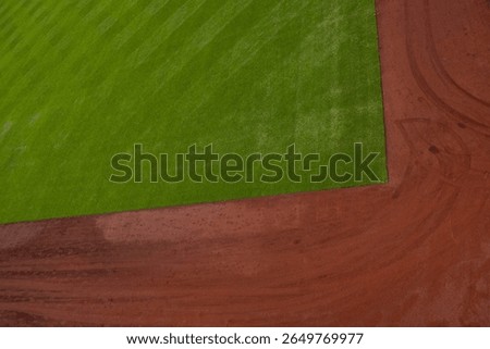 looking down at the Left Field corner and warning track from above Green Monster, Fenway Park, Boston Red Sox, green grass, brown dirt