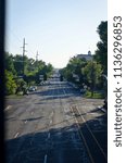 Looking down the long road of the salt lake city streets in the summer sun. 