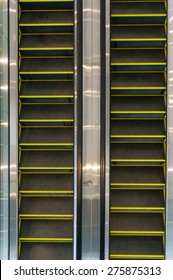 Looking Down At Multiple Escalators In An Office Building