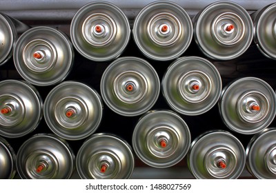 Looking Down On Aerosol Cans On Factory Production Line