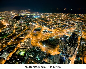 Looking Down On Melbourne At Night Including Albert Park Lake