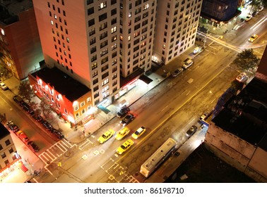 Looking Down On Night Scene Of A Street In Manhatten, Nyc