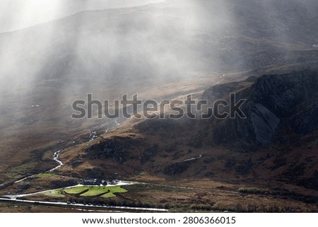 Looking down on the Ogwen valley from Carneddau on a moody autumn day as the rain whipped down the valley.