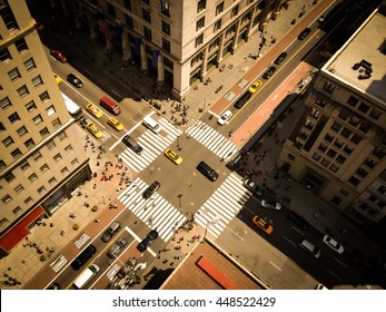 Looking Down On Skyscrapers And The Busy Streets Of New York City.  Yellow Cabs Go Through The Intersection.  Birds Eye View, Toned Image With Instagram Feel.