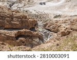 Looking down on two small pools of water near Nahal Rahaf-Rahaf Stream in the Judean Desert in Israel.
