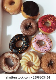 Looking down on a variety of yummy donuts