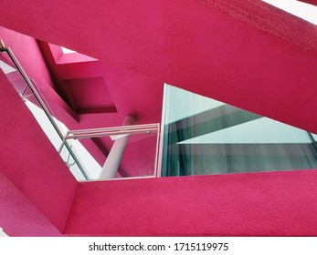 Looking down at a pink straight structure.