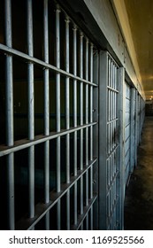 Looking Down Prison Cell Block At Bars