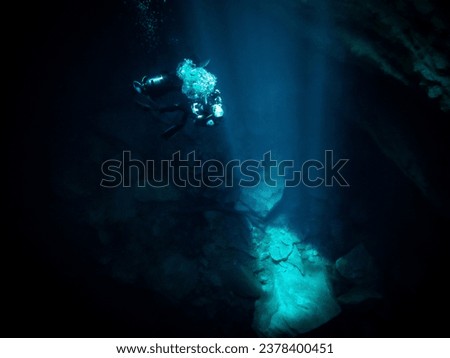 Looking down the shaft of sunlight into the underwater cavern at Buford Sink, Chassahowitzka Wildlife Management Area, Florida, Florida