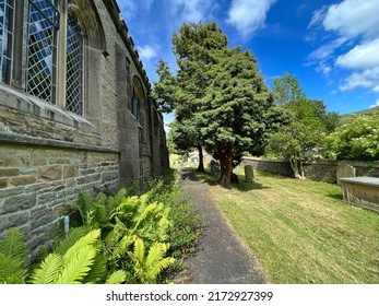 Looking down the side of, St Peter's Church, Stainforth, on a late sunny afternoon near, Settle, UK - Shutterstock ID 2172927399