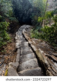Looking Down a Steep Set of Stone Stairs Heading into Arch Rock in the Smokies
