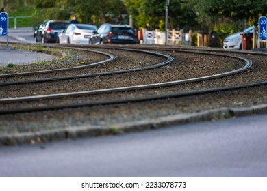 Looking down the vurve of a tramway.