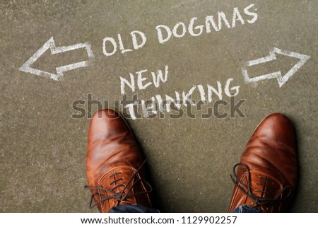 Looking down at the words Old Dogmas or New Thinking