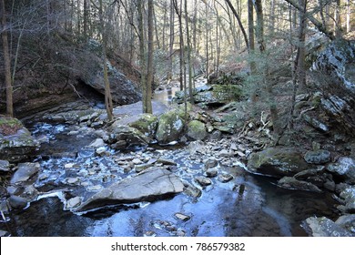 Looking downstream from the falls along Fall Creek, ice begins to accumulate during an artic winter storm at the Ozone Falls State Nature Area in Cumberland County, Tennessee.