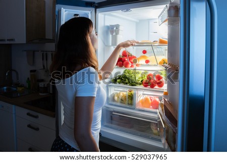 Looking Inside Refrigerator