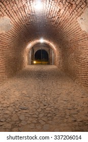 Looking into bricks illuminate the old walled underground passage