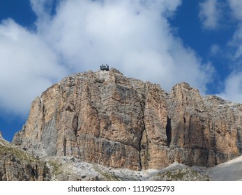 Looking up into the cable car platform part of the Dolomite range of mountains.