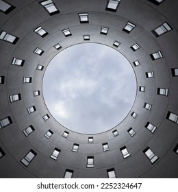Looking up into a tower of windows