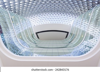 Looking up from the lobby inside a modern building - Powered by Shutterstock