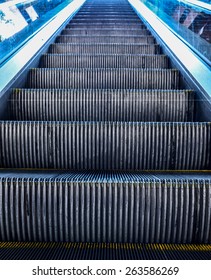 Looking Up At Multiple Escalators Outside Building