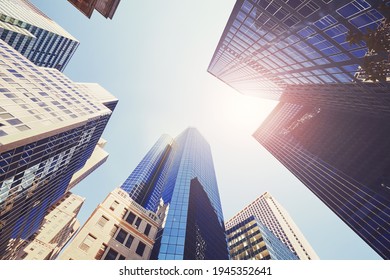 Looking up at New York skyscrapers, color toned picture, USA. - Shutterstock ID 1945352641