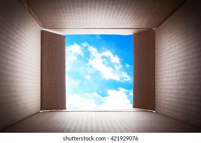 Looking on blue sky. Thinking outside the box concept