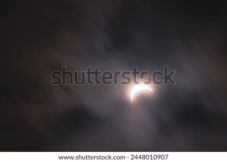 looking up on the solar eclipse abstract moving sky copy space background image, apr 8 th NY state 2024