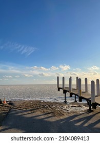 Looking Out At Lake St. Clair In Michigan On A Winter Day At The Boat Launch.