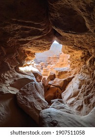 Looking Out From A Sandstone Cave In Goblin Valley National Park.