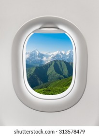 Looking Out The Window Of A Plane To The Mountains In Georgia (Svanetia)