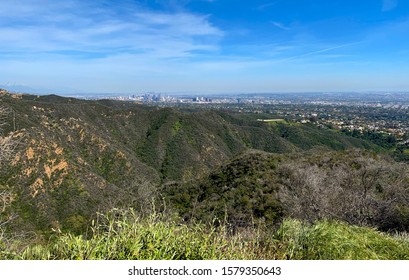 Looking over the Santa Monica Mountains toward Century City, from Temescal Gateway Park hiking trail in Pacific Palisades, CA. - Shutterstock ID 1579350643