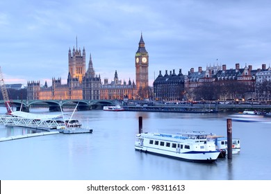 Looking over the Thames to The Houses of Parliament and Big Ben at dusk