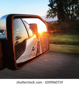 Looking In The Rearview Mirror, Truck And Trailer In Tow