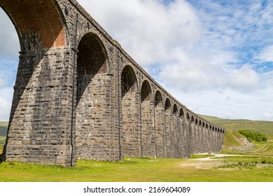 Looking up at the Ribblehead Viaduct under a bright sky pictured in the Yorkshire Dales in June 2022. - Shutterstock ID 2169604089