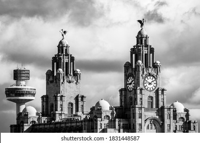 Looking up at the Royal Liver Building in Liverpool from the promenade across the River Mersey in Seacombe.
