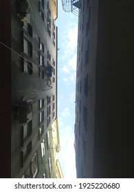 looking at the sky between two buildings