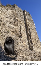 Looking up at the stone exterior of Canterbury Castle in Kent.