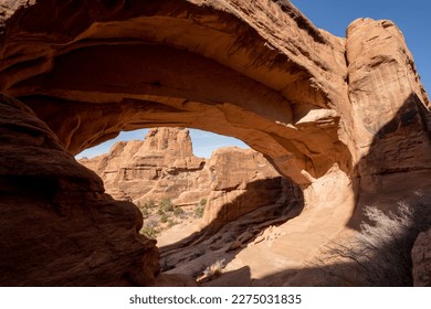 Looking Through The Back Side Of Tower Arch in Arches National Park