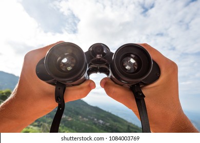 Looking Through The Binoculars. Concept Of Active Travel