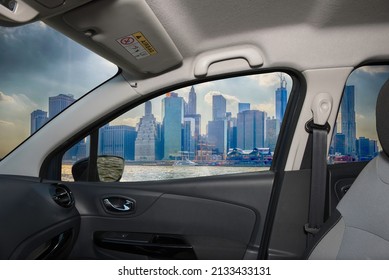 Looking through a car window with view of the financial district of of Manhattan, New York City, USA