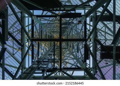 Looking Up Through Metal Frames Of An Old Radio Tower