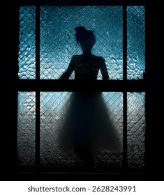 Looking through an old patterned window at a silhouette of a woman wearing a white dress. The image is in blue tone