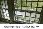 Looking through an old window in Hot Springs, Arkansas, USA
